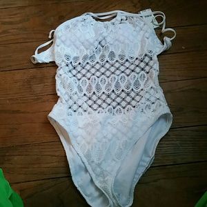 Reaction Kenneth Cole Swim - Women's one piece lace bathing suit. Reaction Kenneth Cole Swim - Women's one piece lace bathing suit.